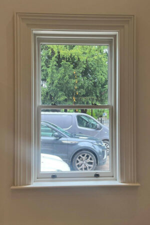 Bordered bold sash-window (from the inside) (photograph)