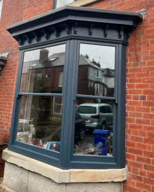 Deep bluey-grey sash bay window (photograph)