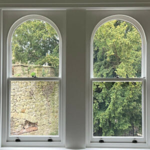 Matching curve-topped sash-windows (photograph)